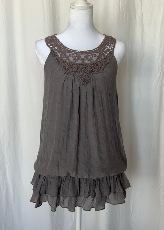 Gray sleeveless dress with lace neckline on a mannequin against a white background