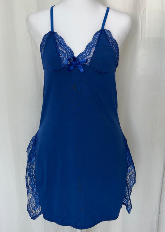 Blue lace-trimmed nightgown on a mannequin against a white background