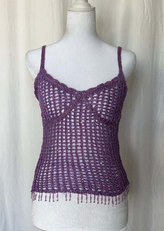 Purple crochet tank top on a mannequin against a white background
